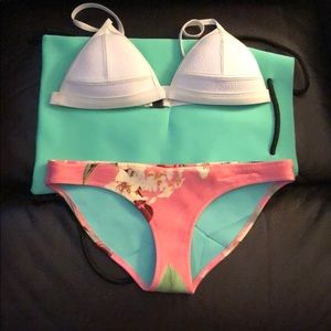 Adorable pink bikini top and bottoms from triangl